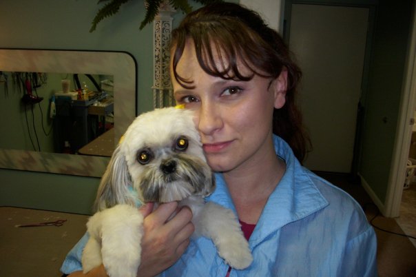 Meet your groomer, Krista Lawson, a profession pet groomer with over 25 years of experience. In the photo, Krista is holding a freshly groomed Havanese.